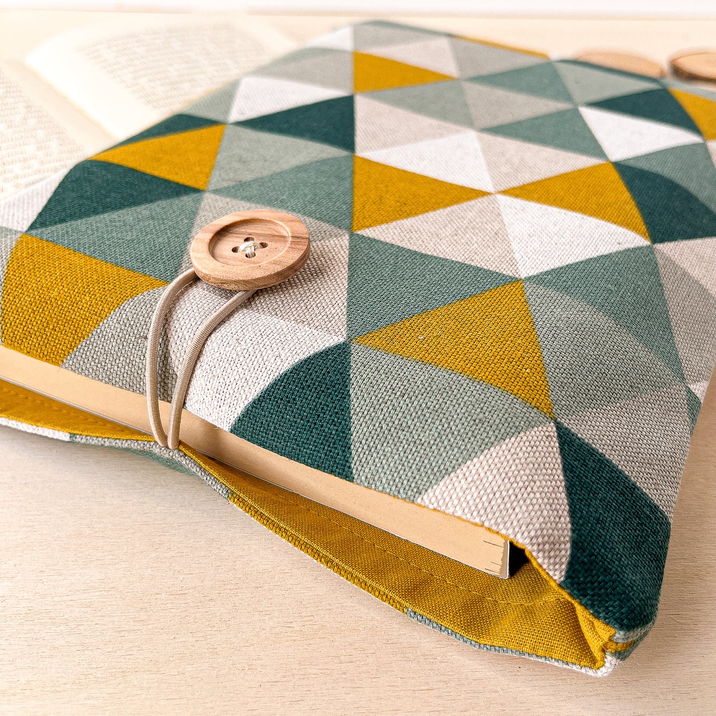 Custodia per libri imbottita in cotone con motivo geometrico