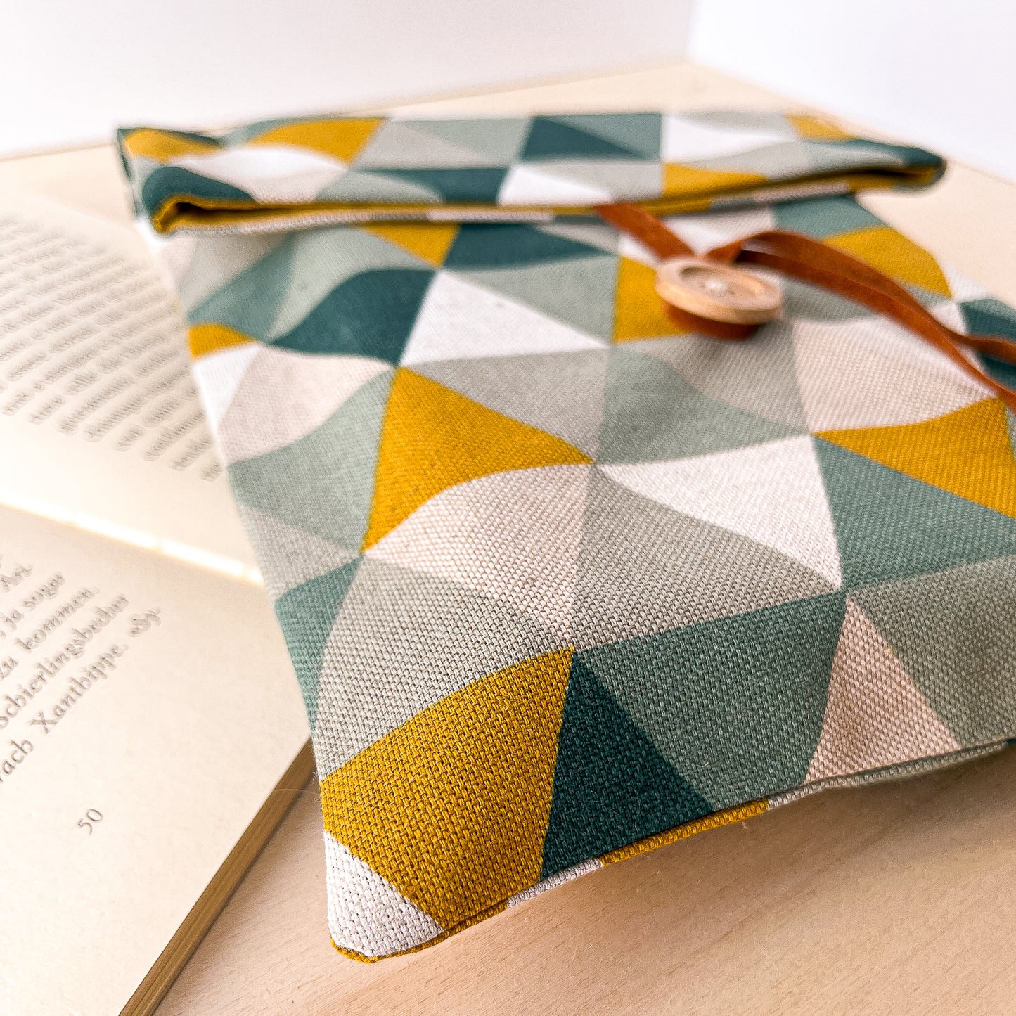 Custodia per libri regolabile in cotone con motivo geometrico