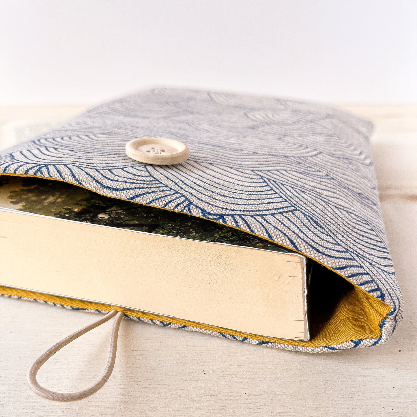 Custodia per libri imbottita in cotone con motivo a onde blu