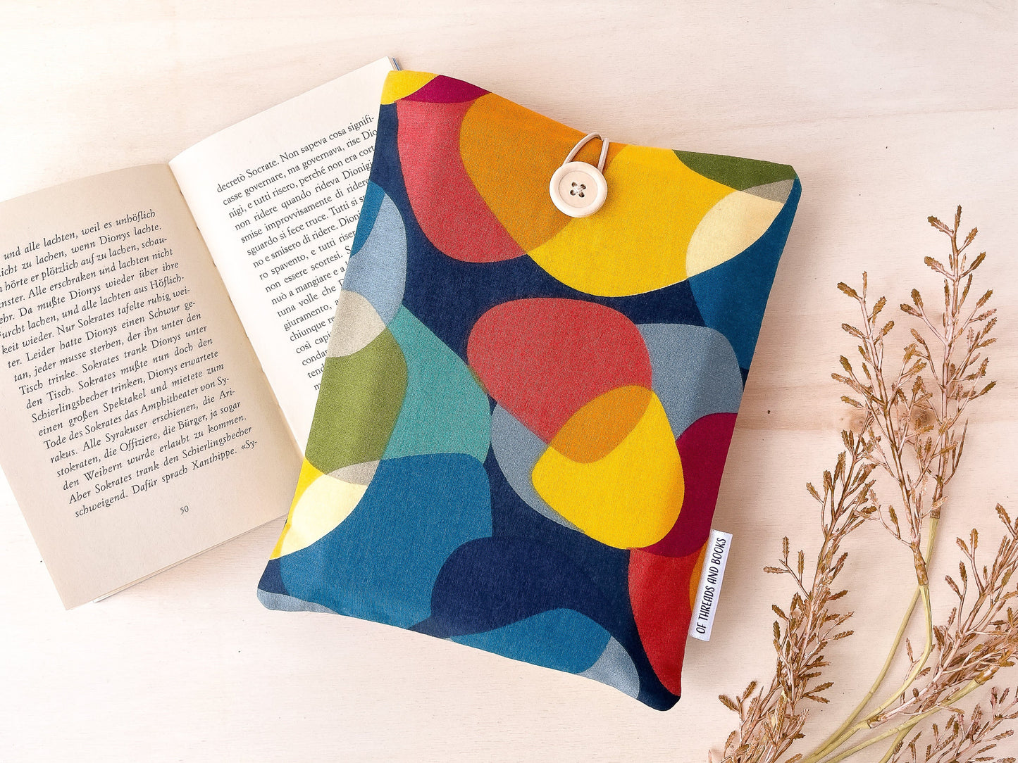 Colorful padded book sleeve
