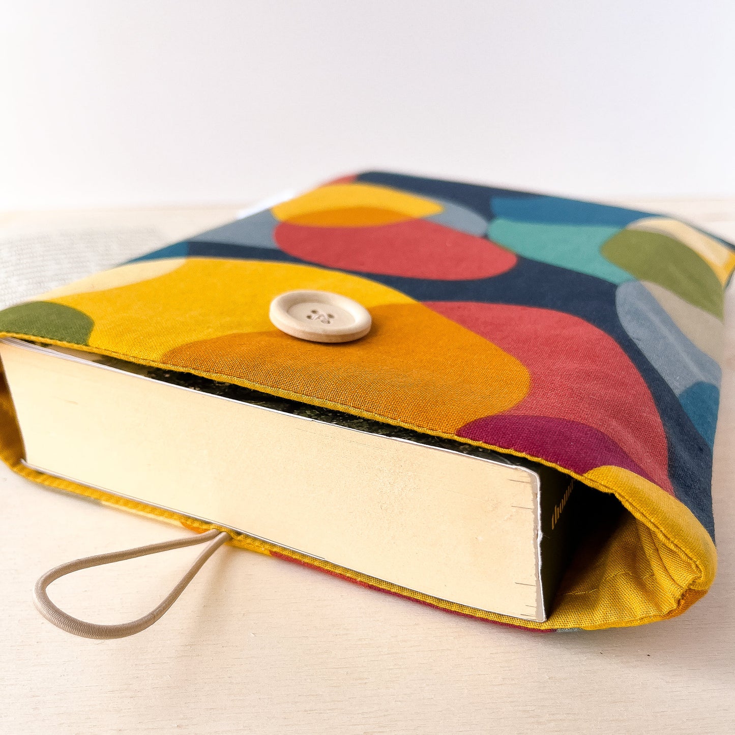 Colorful padded book sleeve