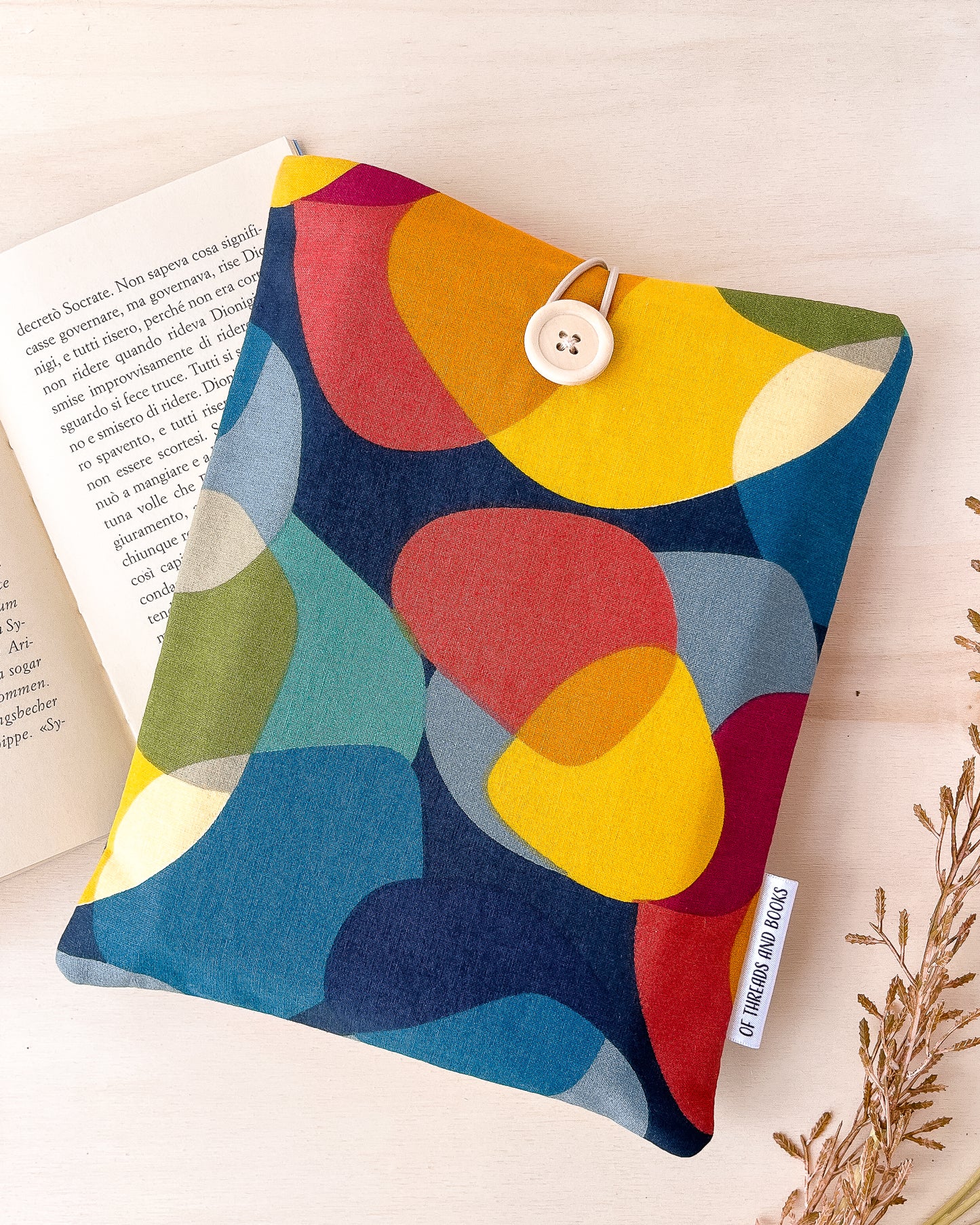 Colorful padded book sleeve