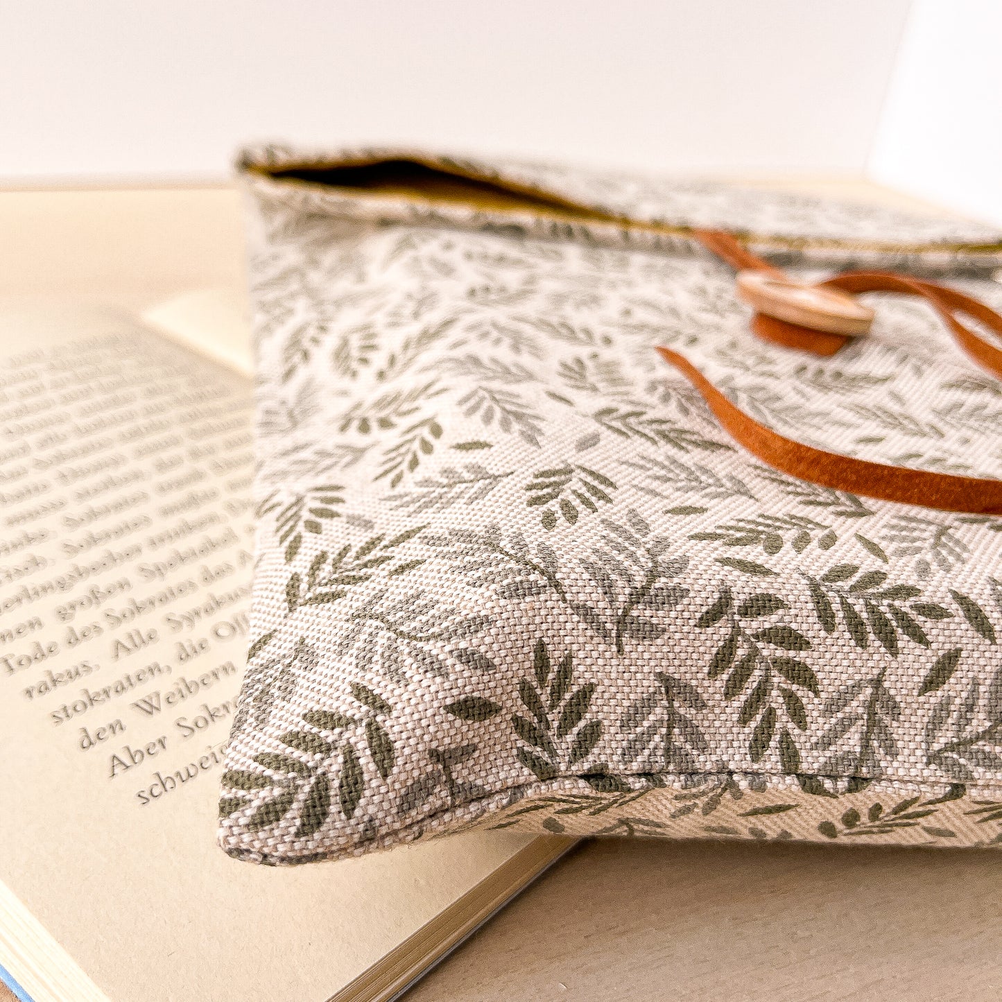 Custodia per libri regolabile in cotone con motivo a foglioline