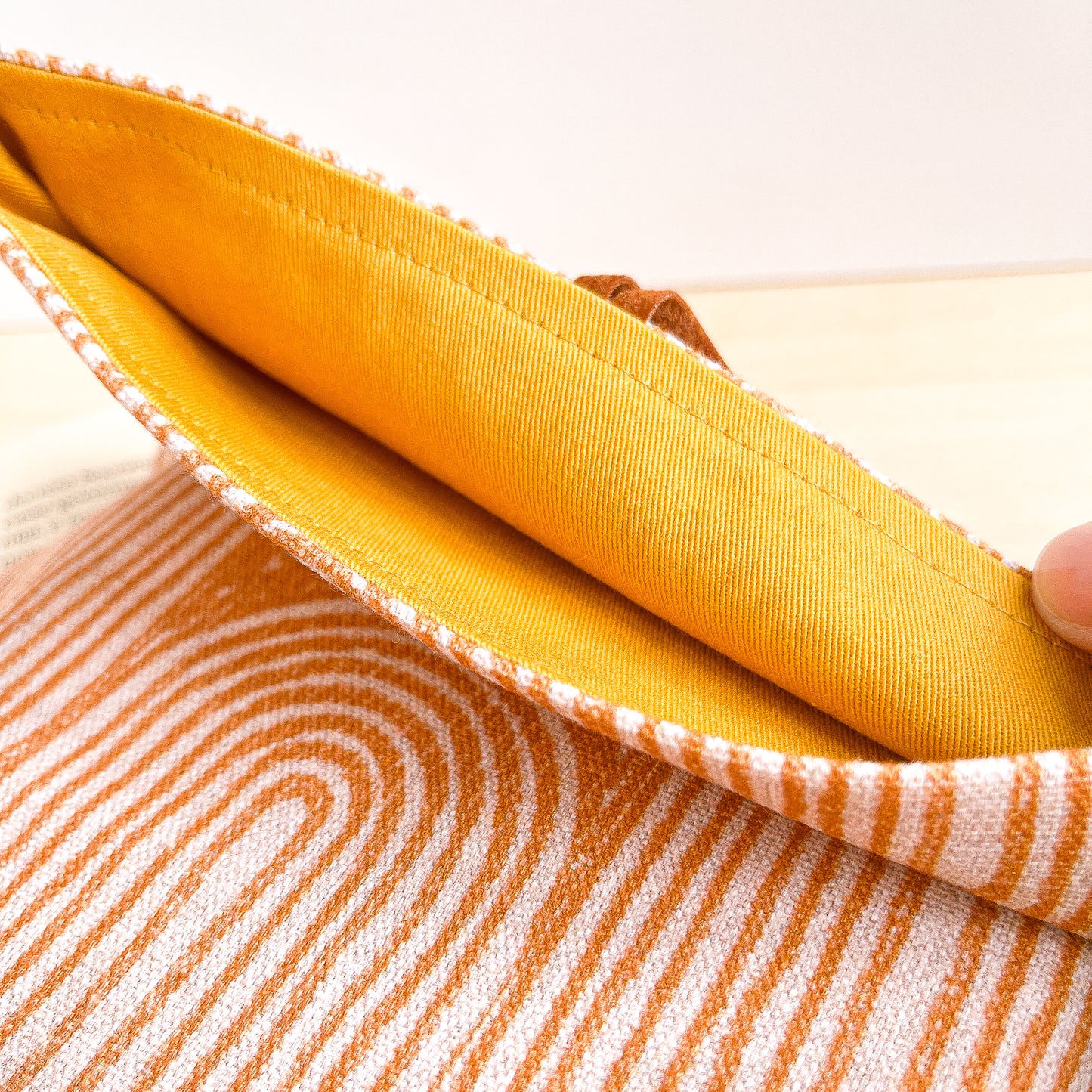 Adjustable orange cotton book sleeve