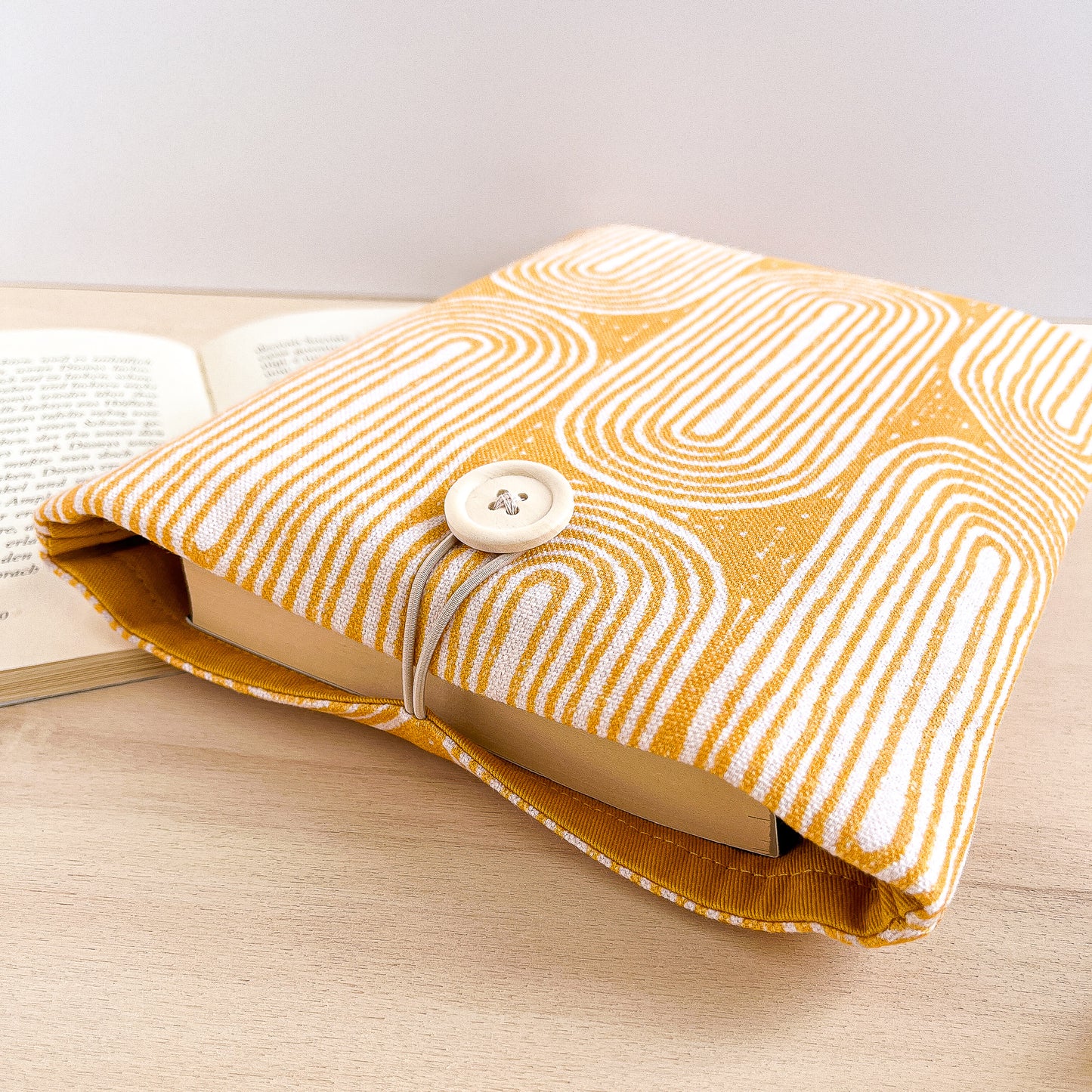 Padded yellow cotton book sleeve
