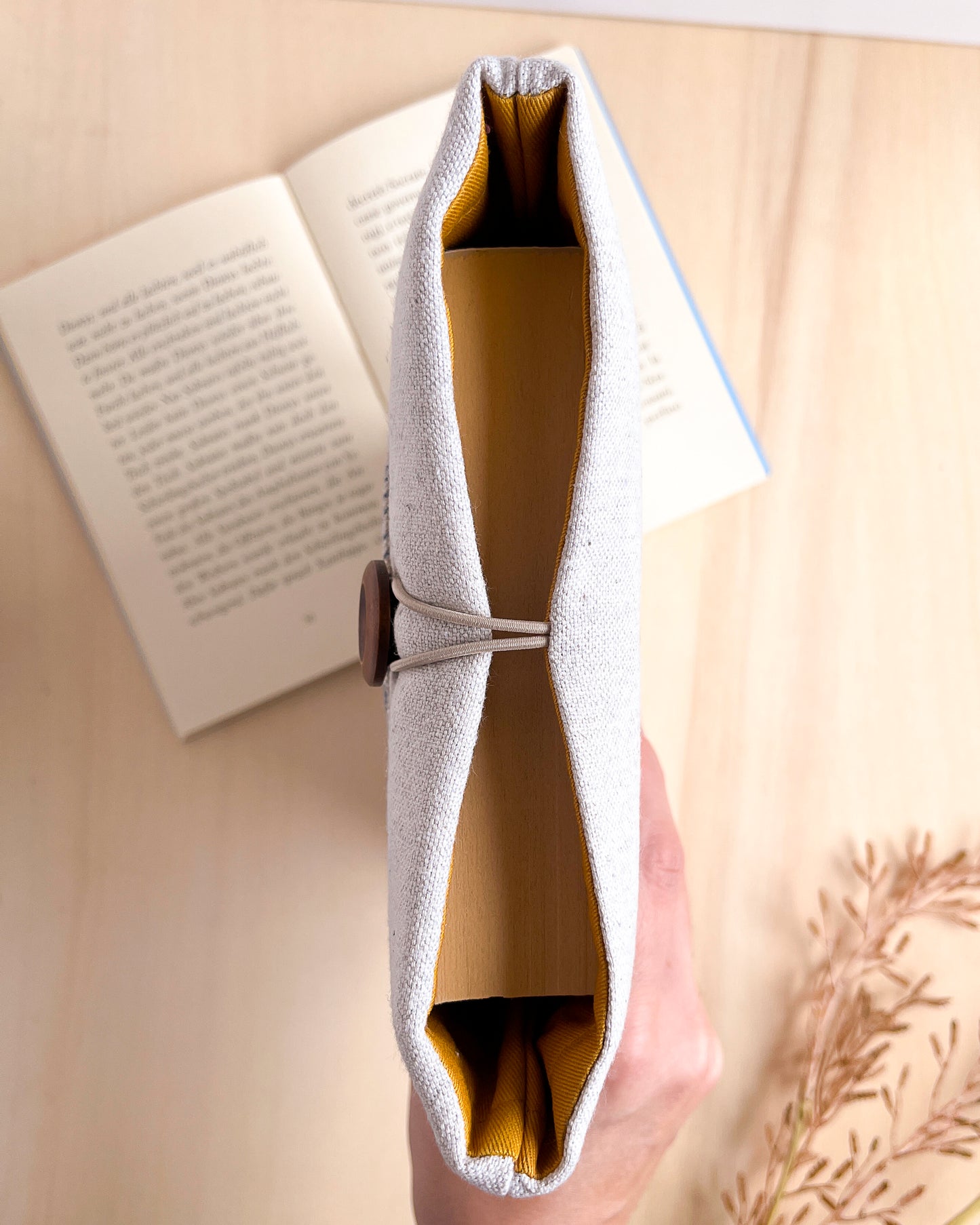 Custodia per libri imbottita con tasca a motivo onde blu