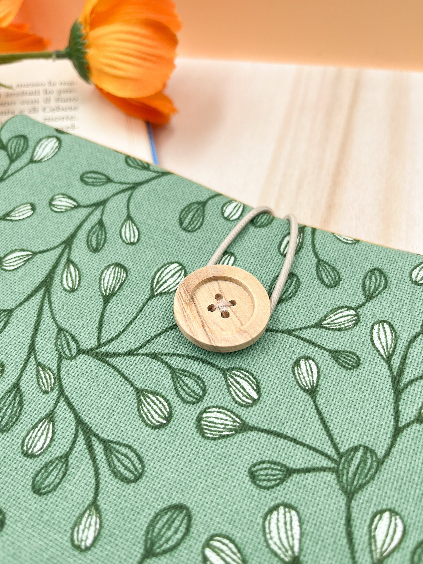 Custodia per libri imbottita in cotone verde con motivo a foglie