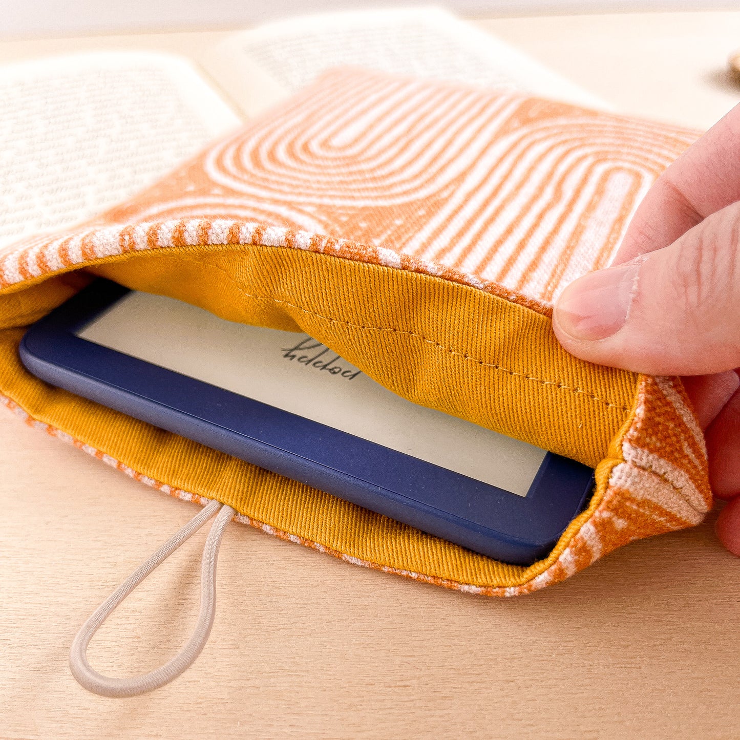 Orange padded e-reader sleeve