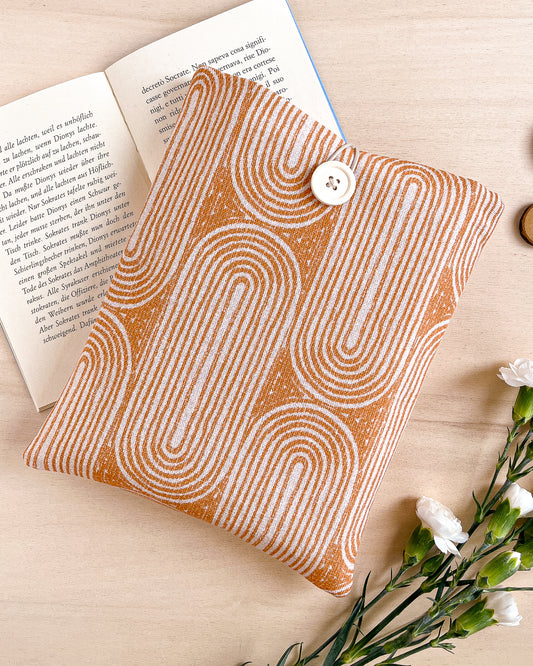 Padded orange cotton book sleeve